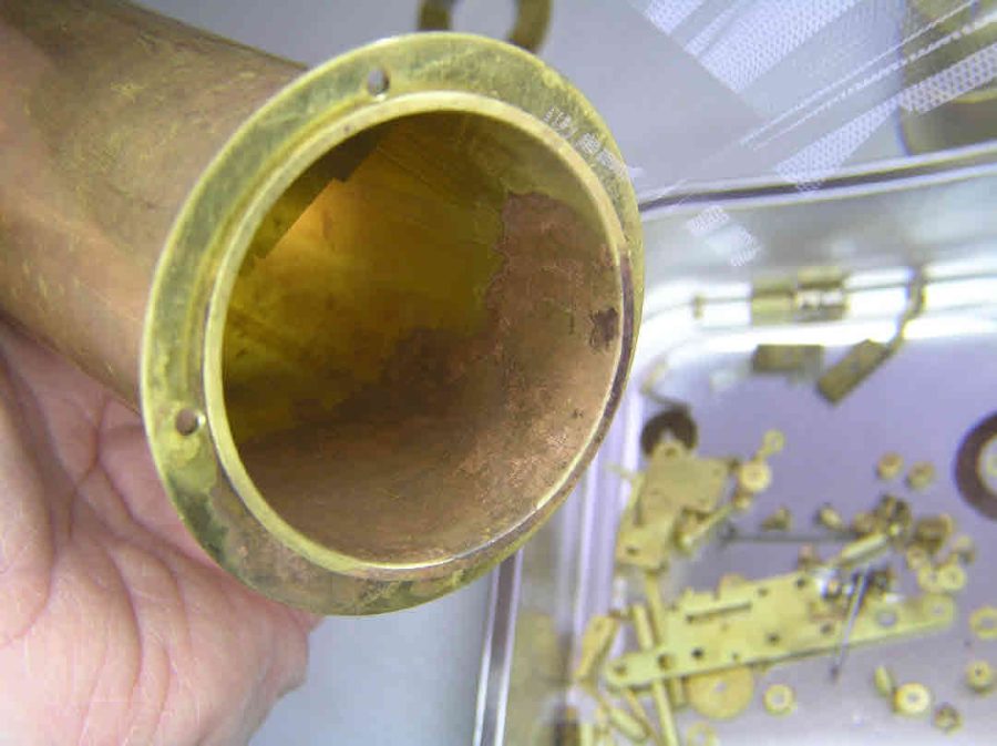 The inside of a Bulle battery column after cleaning, showing coppery patches